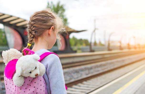 stock-photo-little-girl-waiting-for-train