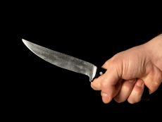 men-s-hand-holds-sharp-knife_192985-703