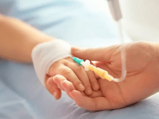 depositphotos_134003682-stock-photo-child-hand-with-catheter