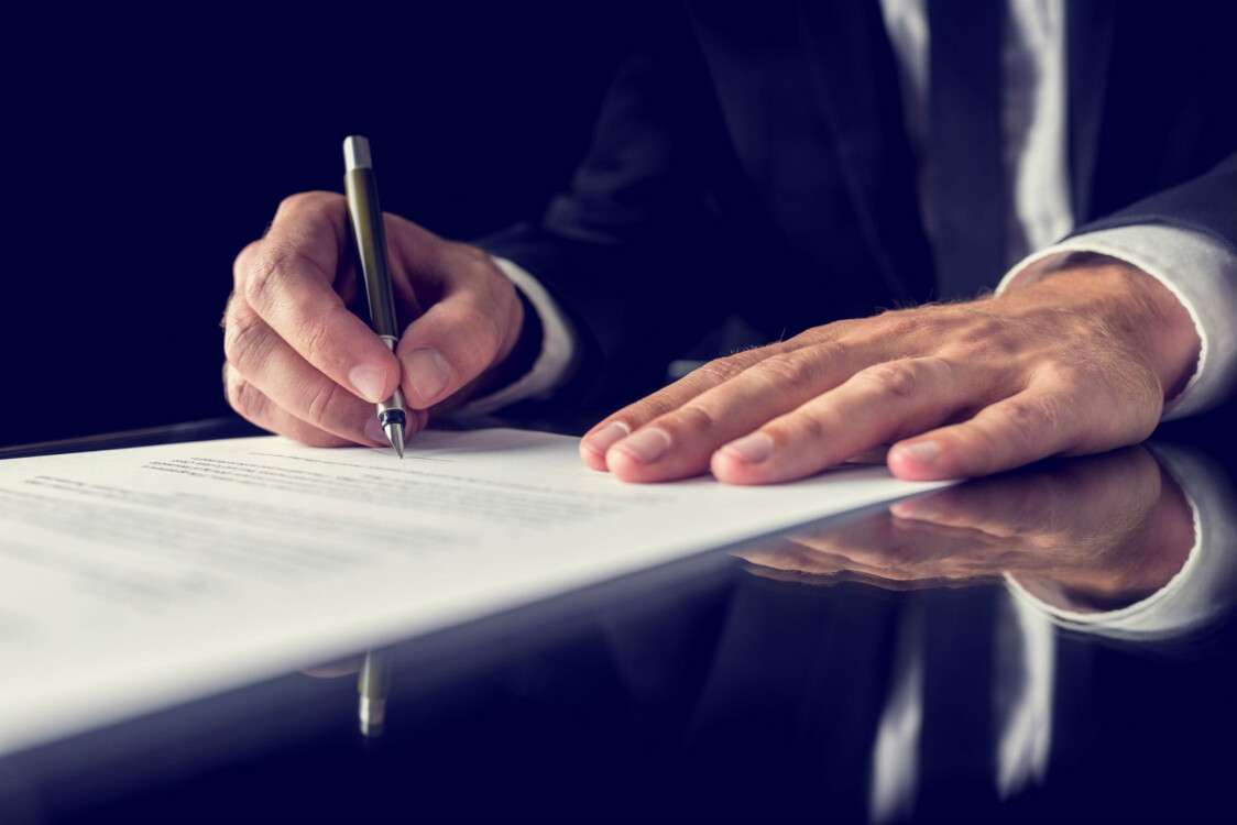 signing-legal-document-PSE9PFT-min-1