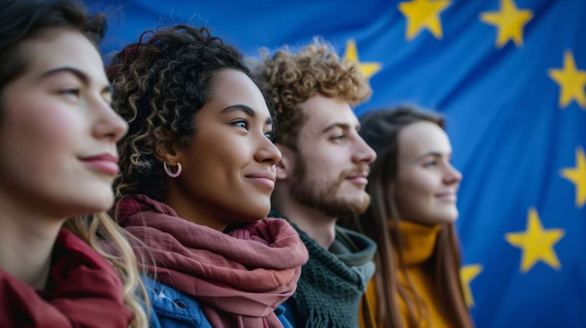 four-young-adults-diverse-smiling-stand-confidently-against-backdrop-european-flag-symb