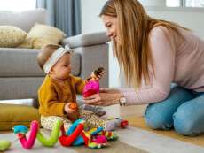 child-girl-and-her-mother-playing-together-with-to-2021-08-29-10-14-04-utc-scaled-1-1536x1025
