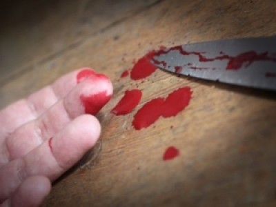 В Кривом Роге мужчина порезал себе вены и ударил ножом в сердце после разговора с сыном